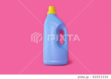 Bottle for washing powder on a bright pink background Bottle for washing powder on a bright pink background 92053330