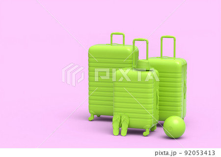 Suitcase with beach ball and flip flops on monochrome pink background. 92053413