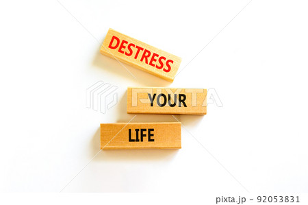 Destress your life symbol. Concept words Destress your life on wooden blocks. Beautiful white table white background. Psychological business and destress your life concept. Copy space. 92053831