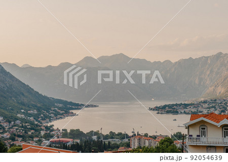 Sunset at Kotor Bay Montenegro. Sunset beautiful landscape. Travel concept. Montenegro, Kotor Bay. View of the sunset in Boko-Kotor Bay in Montenegro. 92054639