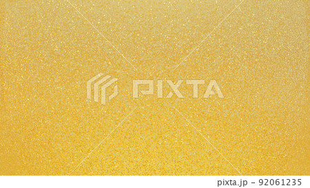 ラメ生地のようにキラキラと輝く金色の背景画像。	 92061235