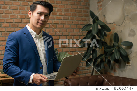 Portrait of Asian handsome business man wearing formal suit 92063447