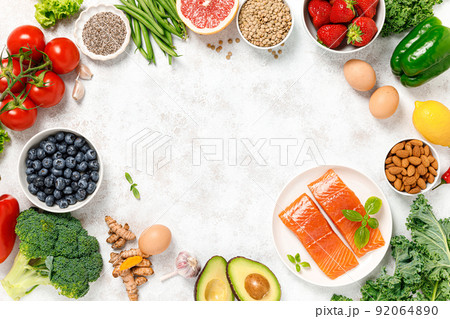 Healthy food. Healthy eating background. Salmon, fruit, vegetable and berry. Superfood Healthy food. Healthy eating background. Salmon, fruit, vegetable and berry. Superfood 92064890