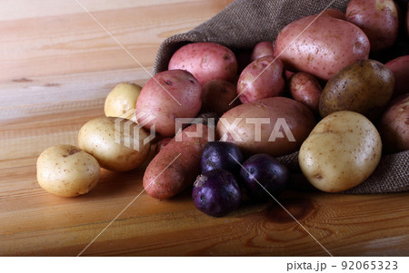 Different potatoes on table Different potatoes on table 92065323