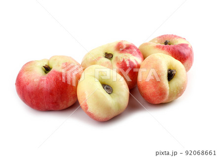 Flat peach (doughnut peach, donut peach, UFO peach, peento peach, saucer peach). Ancient Chinese variety "Pan tao". Delicacy 92068661