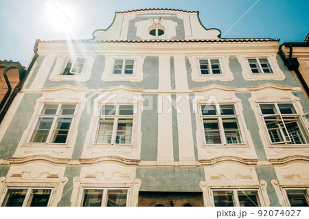 Beautiful cozy narrow street in old town of Prague. Amazing european facades, architecture 92074027