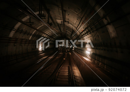 Moving driverless metro train in Oslo, Norway. Riding forward through underground tunnel. Advanced 92074072