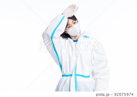 girl in a protective suit on a white background 92075974
