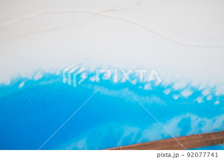 Macro photo of colourful abstract epoxy resin painting. Applicable for design cover, annual report, invitation, flyer, presentation, packaging, poster, business card, wedding invitations. Macro photo of colourful abstract epoxy resin painting. Applicable for design cover, annual report, invitation, flyer, presentation, packaging, poster, business card, wedding invitations. 92077741