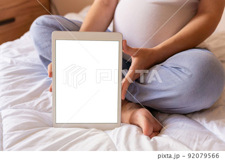 Pregnancy mockup app. Mobile pregnancy online maternity application. Pregnant mother using phone mock up. Pregnancy, medicine, pharmaceutics, health care and people concept. Pregnancy mockup app. Mobile pregnancy online maternity application. Pregnant mother using phone mock up. Pregnancy, medicine, pharmaceutics, health care and people concept. 92079566