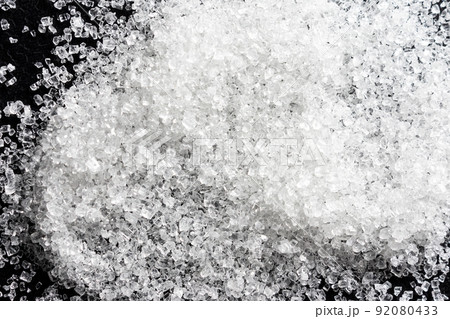 sugar on a black background 92080433