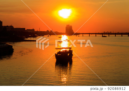 Tourist ship sailing on the Dnieper river at sunset in Dnipro, Ukraine Tourist ship sailing on the Dnieper river at sunset in Dnipro, Ukraine 92086912