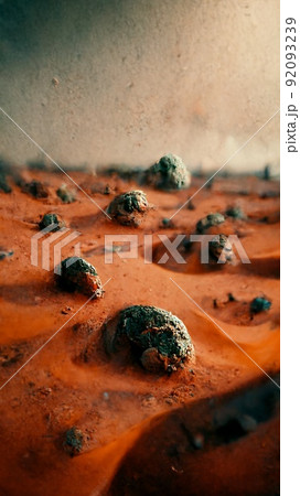 A fantastic Martian landscape in rusty orange colors. The surface of the desert planet Mars, rocks and sand. Alien unusual landscape of red Mars. Perfect for phone wallpaper or for posters. 92093239
