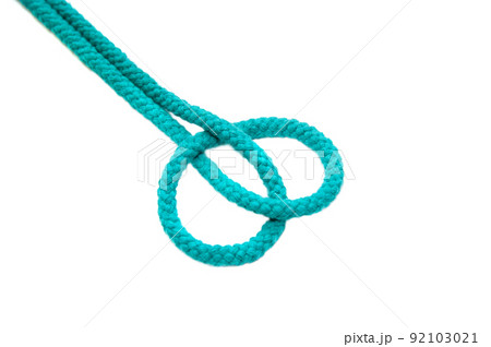 Knot on a cord isolated on a white background . 92103021
