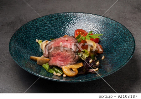 warm salad with beef, mushrooms and vegetables warm salad with beef, mushrooms and vegetables 92103187