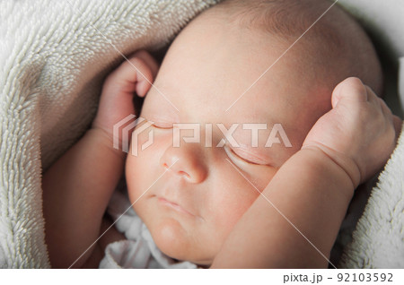 Newborn sleeping close up. Baby care concept.. Newborn sleeping close up. Baby care concept.. 92103592