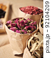 Dried roses, tea ingredients, in the raw bag and white background 92104209
