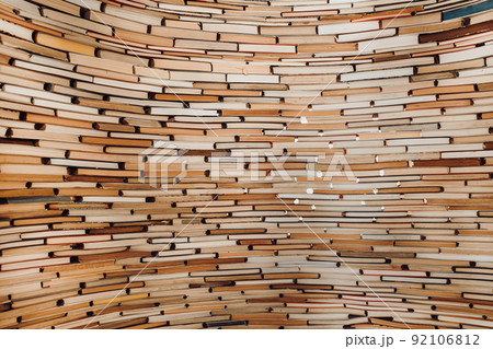 Amazing paper books background. Million volumes in natural pastel colors. Perfect texture backdrop 92106812