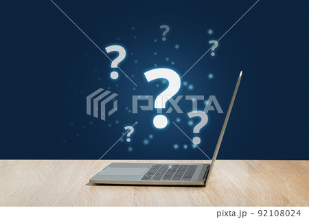Question mark concept or FAQ. Holographic sign over laptop 92108024