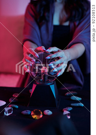 Woman Feeling Energy of Crystal Ball 92108513