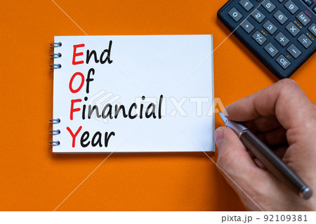 EOFY end of financial year symbol. Concept words EOFY end of financial year on the note on beautiful orange background. Black calculator and pen. Business and EOFY end of financial year concept. EOFY end of financial year symbol. Concept words EOFY end of financial year on the note on beautiful orange background. Black calculator and pen. Business and EOFY end of financial year concept. 92109381