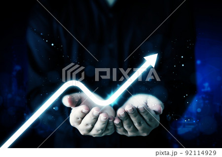 Businessman hand holding virtual arrow graph corporate future growth plan 92114929