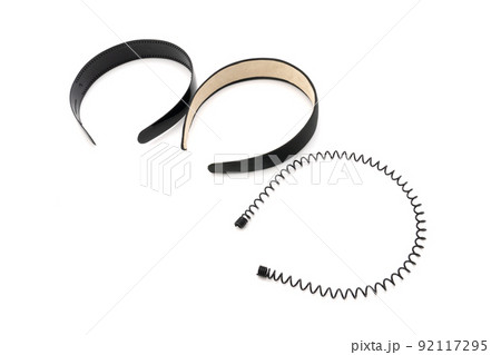 Isolated Black hair band / headband in the stuido light with white background. Isolated Black hair band / headband in the stuido light with white background. 92117295