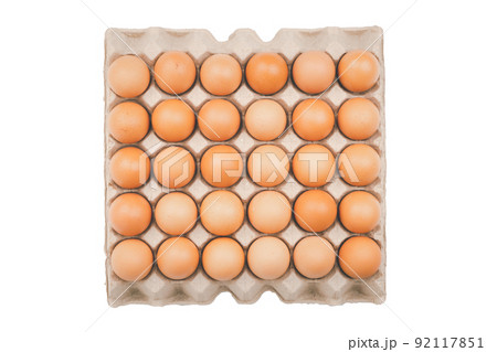 Raw chicken eggs in carton pack isolated on white background, Top view Raw chicken eggs in carton pack isolated on white background, Top view 92117851