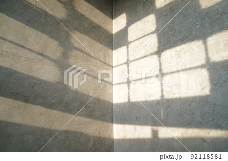 vintage and modern Loft pattern wallpaper style with the window light shadow on it. vintage and modern Loft pattern wallpaper style with the window light shadow on it. 92118581