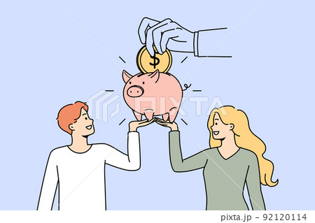 Couple saving money in piggybank  92120114