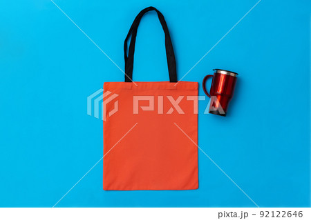 Textile shopping bag and coffee cup flat lay Textile shopping bag and coffee cup flat lay 92122646