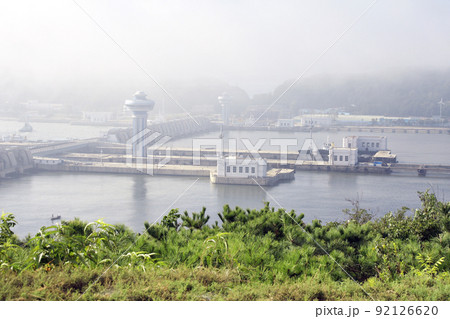 The Nampho Dam (West Sea Barrage) on the river Tedongan, Nampho, North Korea (DPRK) 92126620