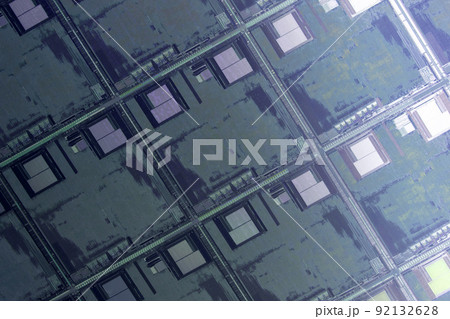 Silicon wafer with microchips used in electronics for the fabrication of integrated circuits. Full-frame high-tech macro background. 92132628