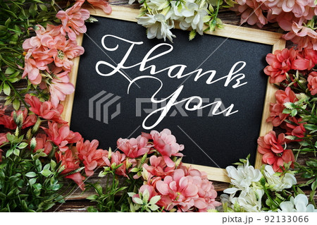 Thank You typography text written on wooden blackboard with flower bouquet decorate on wooden background Thank You typography text written on wooden blackboard with flower bouquet decorate on wooden background 92133066
