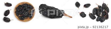 Black raisin isolated on white background. Top view. Flat lay. Set or collection Black raisin isolated on white background. Top view. Flat lay. Set or collection 92136217