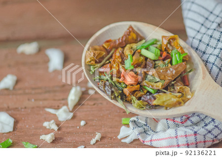 Herbs and spices over  wooden  background. 92136221
