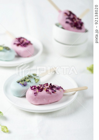 Ice cream bars with pink and green topping Ice cream bars with pink and green topping 92138020