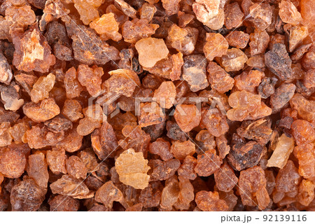 Myrrh resin background. Natural Commiphora myrrha. Sweet Myrrh Opoponax. Incense. Top view. 92139116
