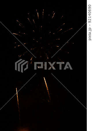 Fireworks exploding against black background 92140690
