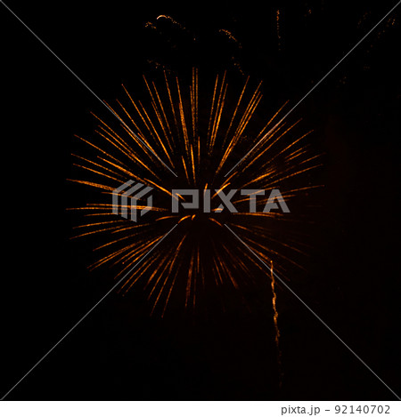 Fireworks exploding against black background Fireworks exploding against black background 92140702