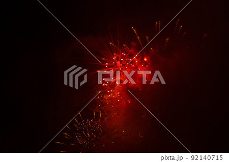 Fireworks exploding against black background 92140715