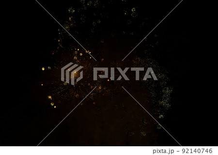 Fireworks exploding against black background 92140746