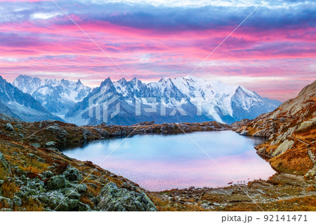 Colourful sunset on Chesery lake in France Alps Colourful sunset on Chesery lake in France Alps 92141471