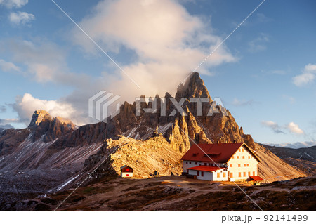 Incredible sunset at the Tre Cime di Lavaredo and rifugio Locatelli Incredible sunset at the Tre Cime di Lavaredo and rifugio Locatelli 92141499