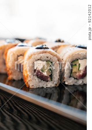 Sushi Rolls California with shrimp, eel, sesame. 92142012