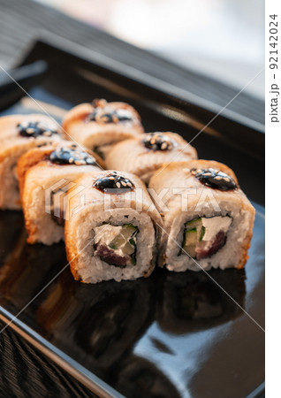 Sushi Rolls California with shrimp, eel, sesame. Sushi Rolls California with shrimp, eel, sesame. 92142024