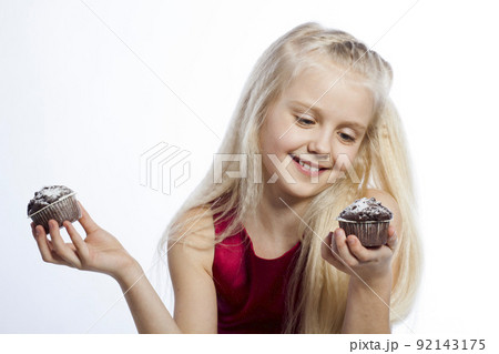 Girl gives a chocolate cake Girl gives a chocolate cake 92143175