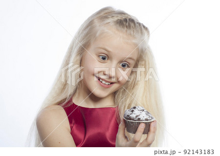 Girl gives a chocolate cake Girl gives a chocolate cake 92143183