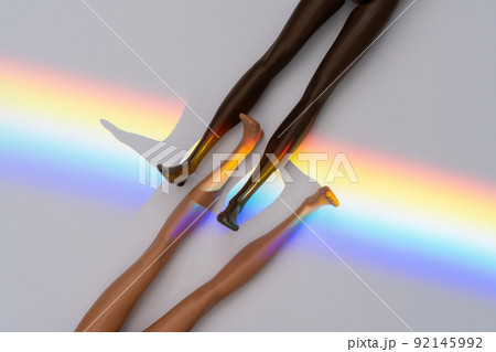 Black and white legs of toys like symbol of support all people skin 92145992