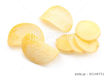crispy chips and raw potato on white background crispy chips and raw potato on white background 92146751